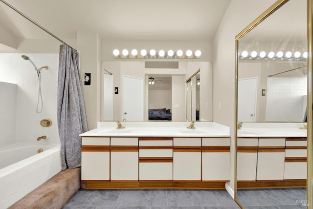 3327 Colonial Ct, Fairfield, CA 94534 - ensuite bathroom featuring a ceiling fan, shower / bath combo with shower curtain, double vanity, and tile patterned floors