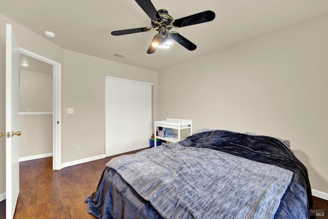 3327 Colonial Ct, Fairfield, CA 94534 - bedroom with wood finished floors, baseboards, a closet, and a ceiling fan