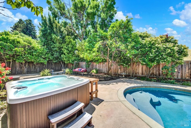 3327 Colonial Ct, Fairfield, CA 94534 - view of pool with a hot tub, a fenced backyard, and a patio