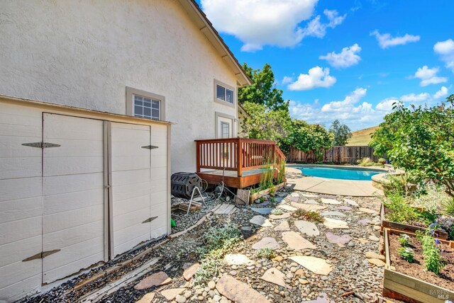 3327 Colonial Ct, Fairfield, CA 94534 - view of pool featuring a wooden deck and a fenced backyard