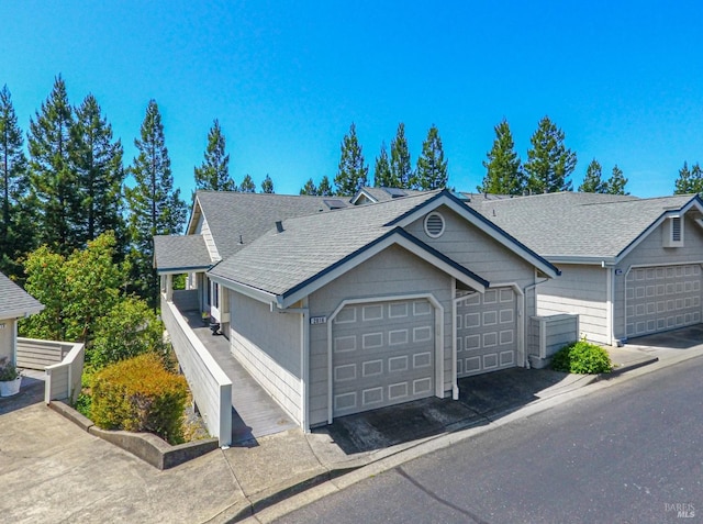 2016 Stonefield Ln, Santa Rosa, CA 95403 - ranch-style home featuring a shingled roof and a detached garage