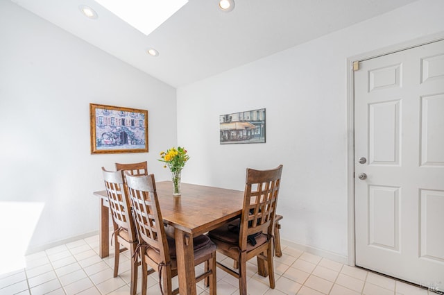 2016 Stonefield Ln, Santa Rosa, CA 95403 - dining room featuring lofted ceiling, a skylight, recessed lighting, light tile patterned floors, and baseboards