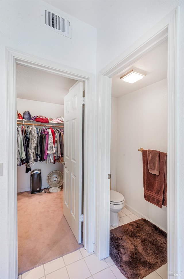 2016 Stonefield Ln, Santa Rosa, CA 95403 - bathroom with tile patterned flooring, toilet, and a spacious closet