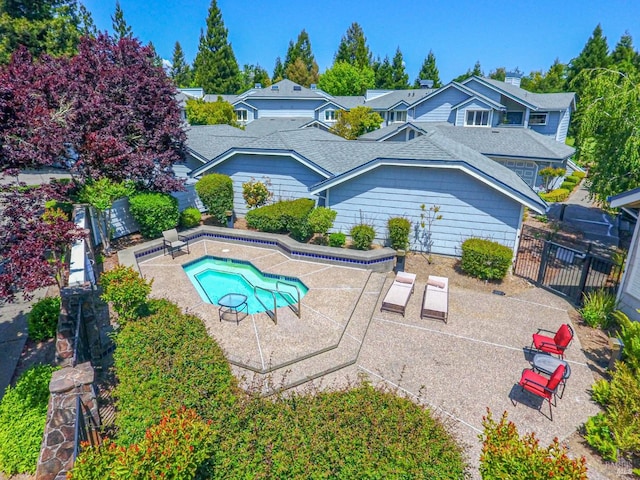 2016 Stonefield Ln, Santa Rosa, CA 95403 - rear view of house featuring an in-ground hot tub