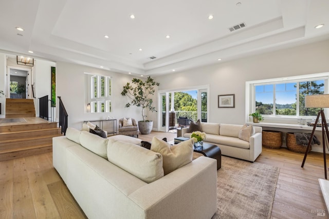 6 Live Oak Way, San Rafael, CA 94901 - living area with a tray ceiling, light wood finished floors, recessed lighting, and stairway