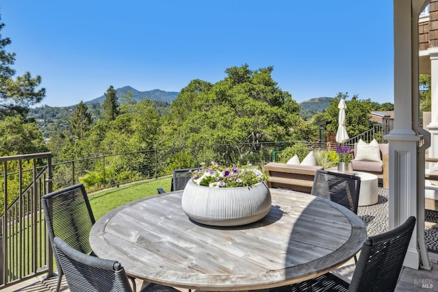 6 Live Oak Way, San Rafael, CA 94901 - deck featuring outdoor dining space, a mountain view, and a view of trees