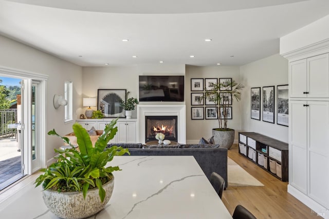 6 Live Oak Way, San Rafael, CA 94901 - living area with light wood-style flooring, a glass covered fireplace, and recessed lighting