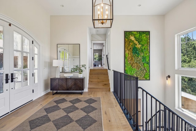 6 Live Oak Way, San Rafael, CA 94901 - foyer entrance featuring wood finished floors, a chandelier, and french doors