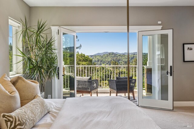 6 Live Oak Way, San Rafael, CA 94901 - carpeted bedroom with access to exterior, multiple windows, a mountain view, and baseboards