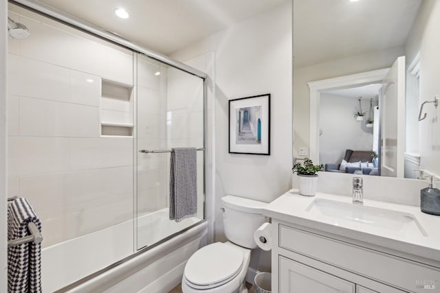 6 Live Oak Way, San Rafael, CA 94901 - ensuite bathroom featuring toilet, enclosed tub / shower combo, vanity, and recessed lighting