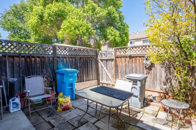 710 Daniels Ave, Vallejo, CA 94590 - fenced backyard with a patio area and a gate