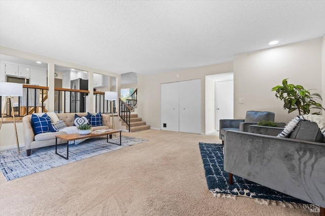 1503 Galaxy Ct, Rohnert Park, CA 94928 - living room featuring light carpet, stairway, a textured ceiling, baseboards, and recessed lighting