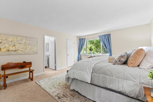 1503 Galaxy Ct, Rohnert Park, CA 94928 - carpeted bedroom featuring baseboards, a textured ceiling, and ensuite bathroom