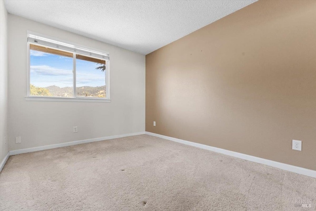 1503 Galaxy Ct, Rohnert Park, CA 94928 - carpeted empty room with a textured ceiling and baseboards