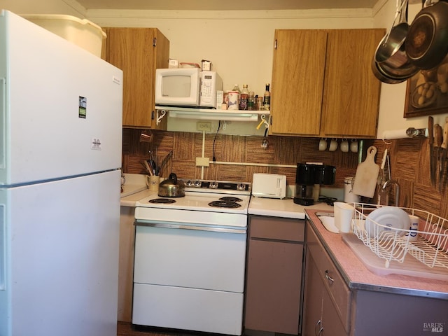25500 Fairbanks Ln, Covelo, CA 95428 - kitchen with white appliances, decorative backsplash, light countertops, and open shelves