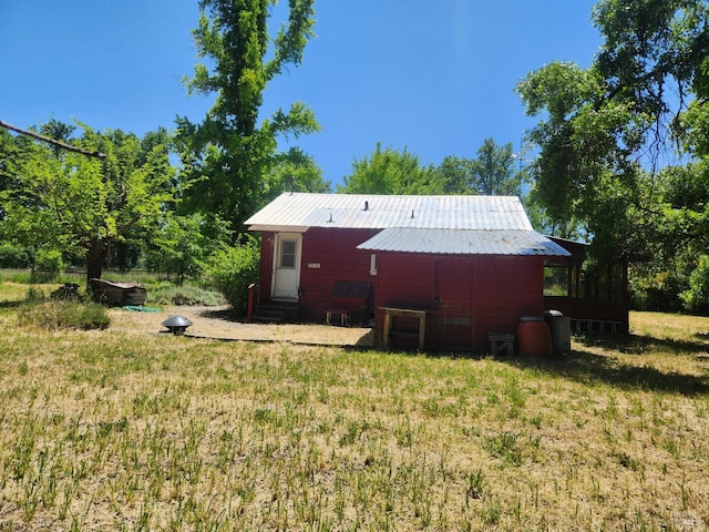 25500 Fairbanks Ln, Covelo, CA 95428 - rear view of house with a lawn and metal roof
