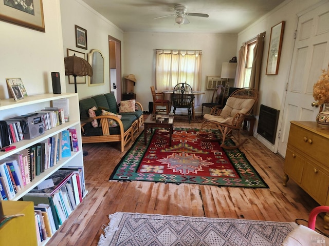 25500 Fairbanks Ln, Covelo, CA 95428 - sitting room featuring wood-type flooring, ceiling fan, ornamental molding, and heating unit