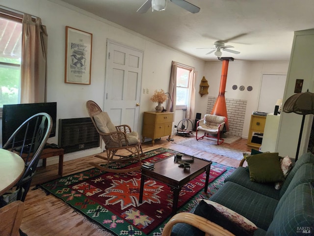 25500 Fairbanks Ln, Covelo, CA 95428 - living area featuring wood finished floors, ceiling fan, and crown molding