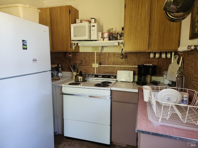 25500 Fairbanks Ln, Covelo, CA 95428 - kitchen with white appliances, backsplash, and light countertops