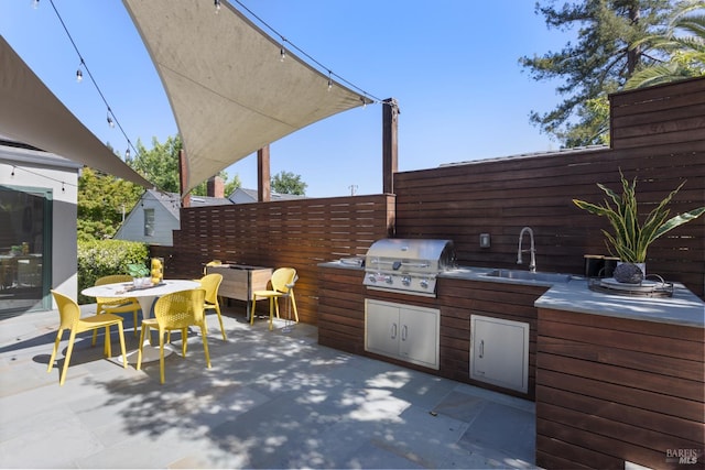 55 Durham Rd, San Anselmo, CA 94960 - view of patio / terrace featuring a sink and outdoor dining space