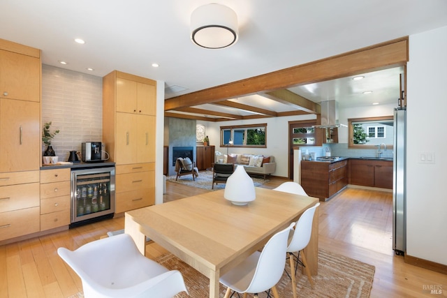 55 Durham Rd, San Anselmo, CA 94960 - dining room with wine cooler, light wood-type flooring, beam ceiling, recessed lighting, and a bar