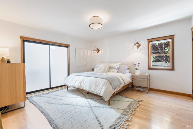 55 Durham Rd, San Anselmo, CA 94960 - bedroom with light wood-style floors and baseboards
