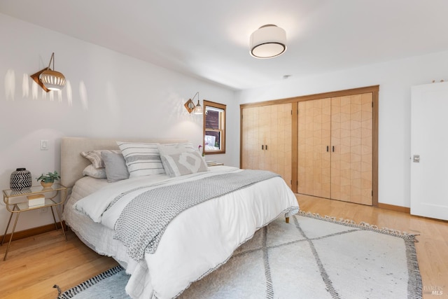 55 Durham Rd, San Anselmo, CA 94960 - bedroom with light wood-style floors, a closet, and baseboards