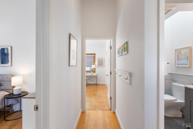 55 Durham Rd, San Anselmo, CA 94960 - corridor with light wood-style flooring and baseboards