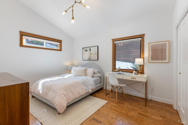 55 Durham Rd, San Anselmo, CA 94960 - bedroom with lofted ceiling, wood finished floors, a closet, a chandelier, and a desk