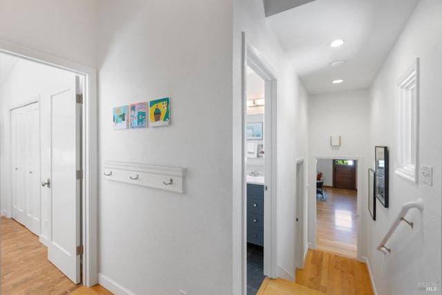 55 Durham Rd, San Anselmo, CA 94960 - hallway featuring light wood-style floors, baseboards, and recessed lighting