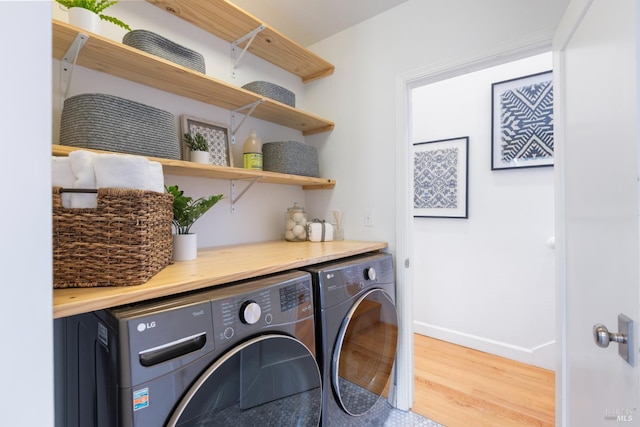 55 Durham Rd, San Anselmo, CA 94960 - laundry area featuring washer and dryer, wood finished floors, and baseboards
