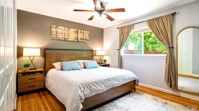 1523 Bruce Ct, Santa Rosa, CA 95401 - bedroom with wood finished floors, baseboards, and ceiling fan