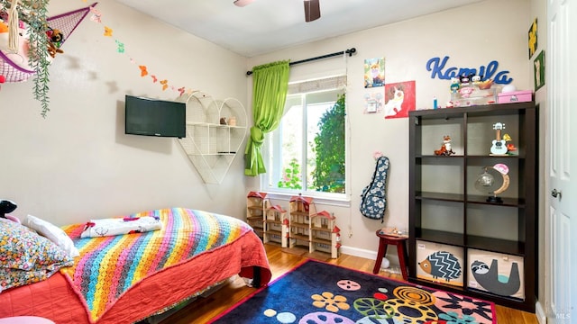 1523 Bruce Ct, Santa Rosa, CA 95401 - bedroom with wood finished floors, a ceiling fan, and baseboards