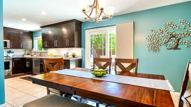 1523 Bruce Ct, Santa Rosa, CA 95401 - dining space featuring a chandelier, light tile patterned flooring, and recessed lighting