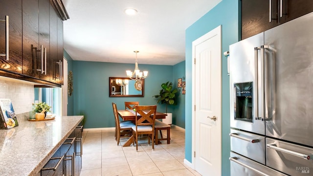 1523 Bruce Ct, Santa Rosa, CA 95401 - dining room with a chandelier, baseboards, and light tile patterned floors