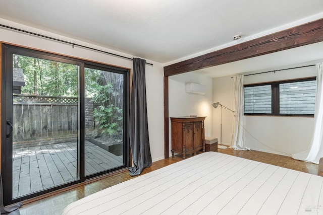 4011 Mill Creek Rd, Healdsburg, CA 95448 - unfurnished bedroom featuring access to outside, a wall mounted AC, and baseboards
