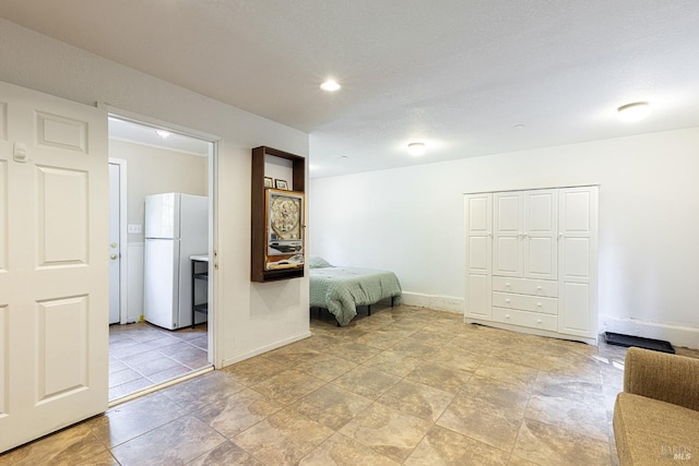 4011 Mill Creek Rd, Healdsburg, CA 95448 - bedroom featuring freestanding refrigerator and baseboards