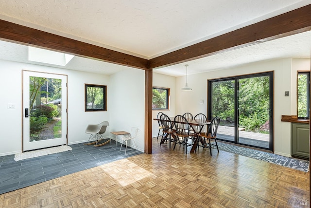 4011 Mill Creek Rd, Healdsburg, CA 95448 - dining space with baseboards, plenty of natural light, and a textured ceiling