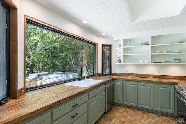 4011 Mill Creek Rd, Healdsburg, CA 95448 - kitchen with butcher block counters, a sink, dishwasher, range, and a textured ceiling