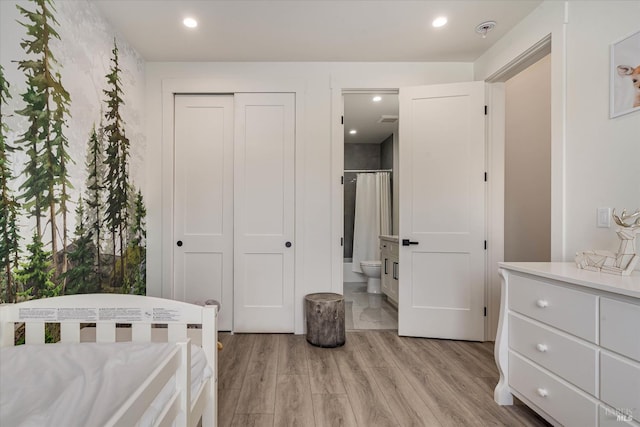 1994 W Bristlecone Ct, Santa Rosa, CA 95403 - bedroom with light wood finished floors, ensuite bath, a closet, and recessed lighting