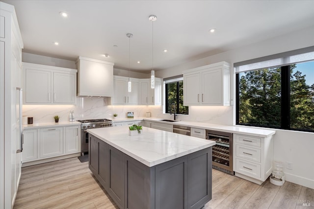 1994 W Bristlecone Ct, Santa Rosa, CA 95403 - kitchen with wine cooler, stainless steel appliances, a sink, plenty of natural light, and recessed lighting