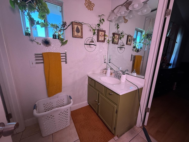 561 Samuel Way, Sacramento, CA 95838 - bathroom featuring vanity and tile patterned flooring