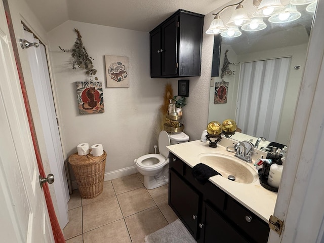 561 Samuel Way, Sacramento, CA 95838 - full bath featuring vanity, toilet, tile patterned flooring, and lofted ceiling