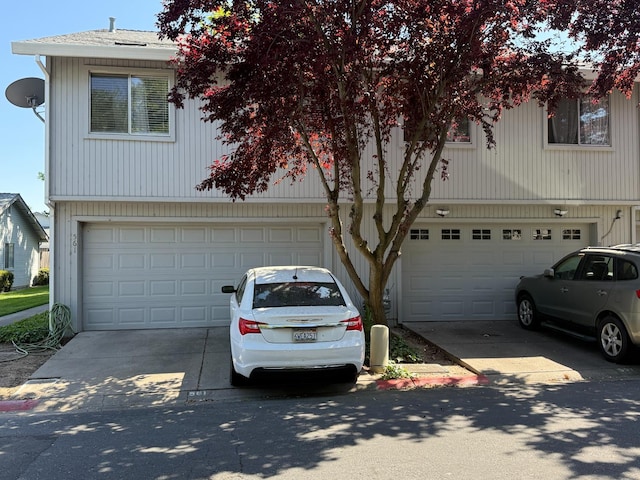 561 Samuel Way, Sacramento, CA 95838 - view of front of house with concrete driveway and a garage