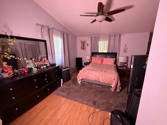 561 Samuel Way, Sacramento, CA 95838 - bedroom featuring vaulted ceiling, light wood-style flooring, and ceiling fan