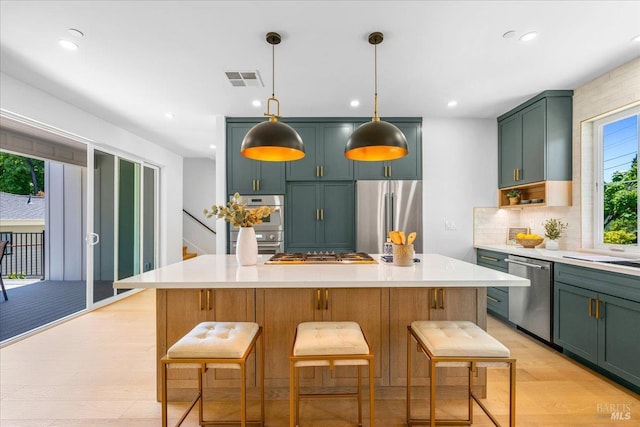 22 Cedar Ave, Kentfield, CA 94904 - kitchen featuring appliances with stainless steel finishes, green cabinetry, light countertops, decorative backsplash, and recessed lighting