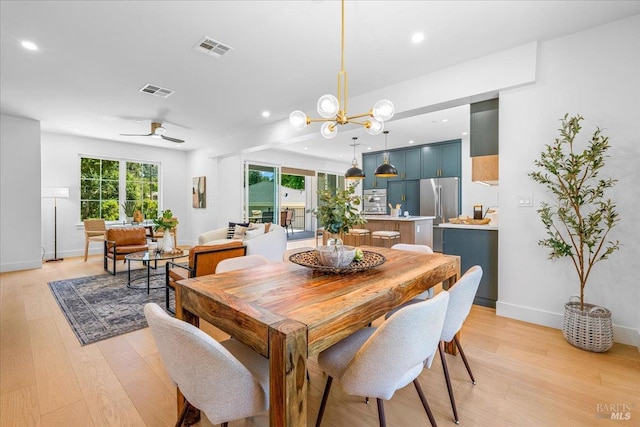 22 Cedar Ave, Kentfield, CA 94904 - dining space with light wood-style flooring, plenty of natural light, recessed lighting, baseboards, and a chandelier