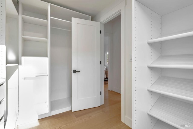 22 Cedar Ave, Kentfield, CA 94904 - walk in closet featuring light wood-style floors