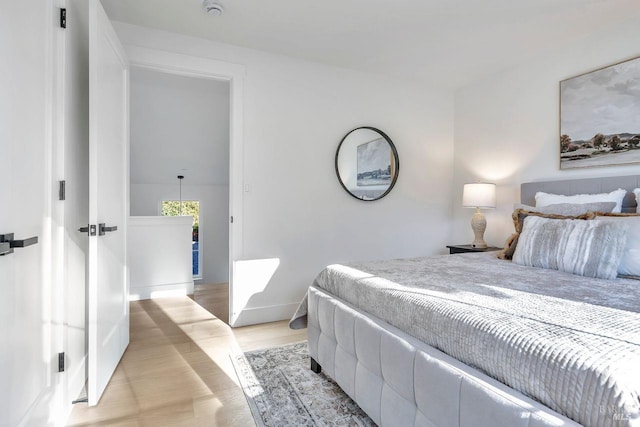 22 Cedar Ave, Kentfield, CA 94904 - bedroom featuring light wood-style flooring and baseboards