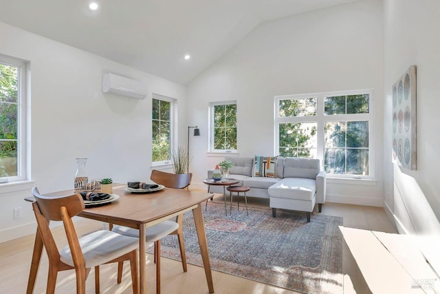 22 Cedar Ave, Kentfield, CA 94904 - office space featuring an AC wall unit, high vaulted ceiling, light wood-style floors, recessed lighting, and baseboards